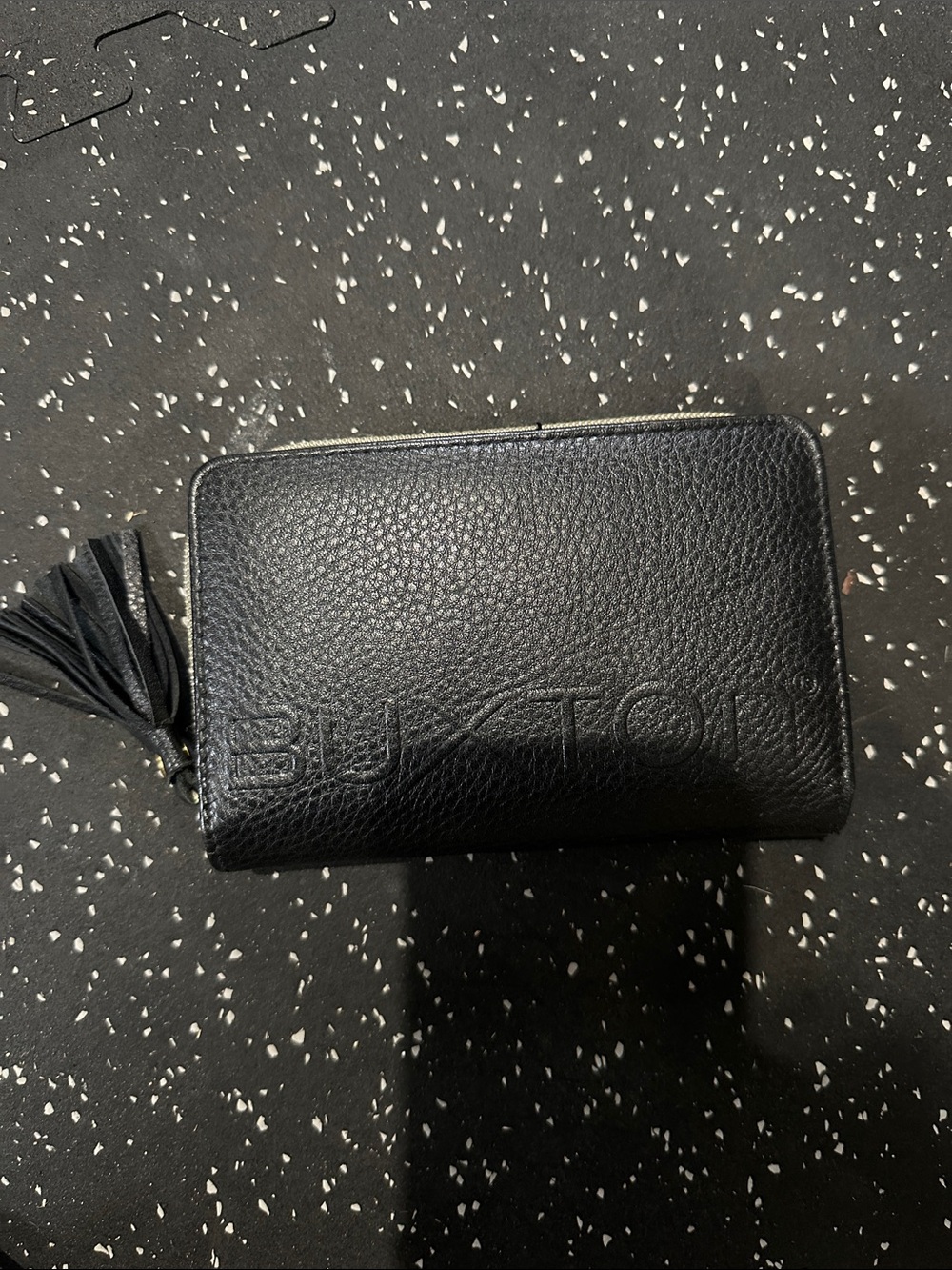 Buxton Black Pebbled Genuine Leather Zip Wallet with Tassel Accent